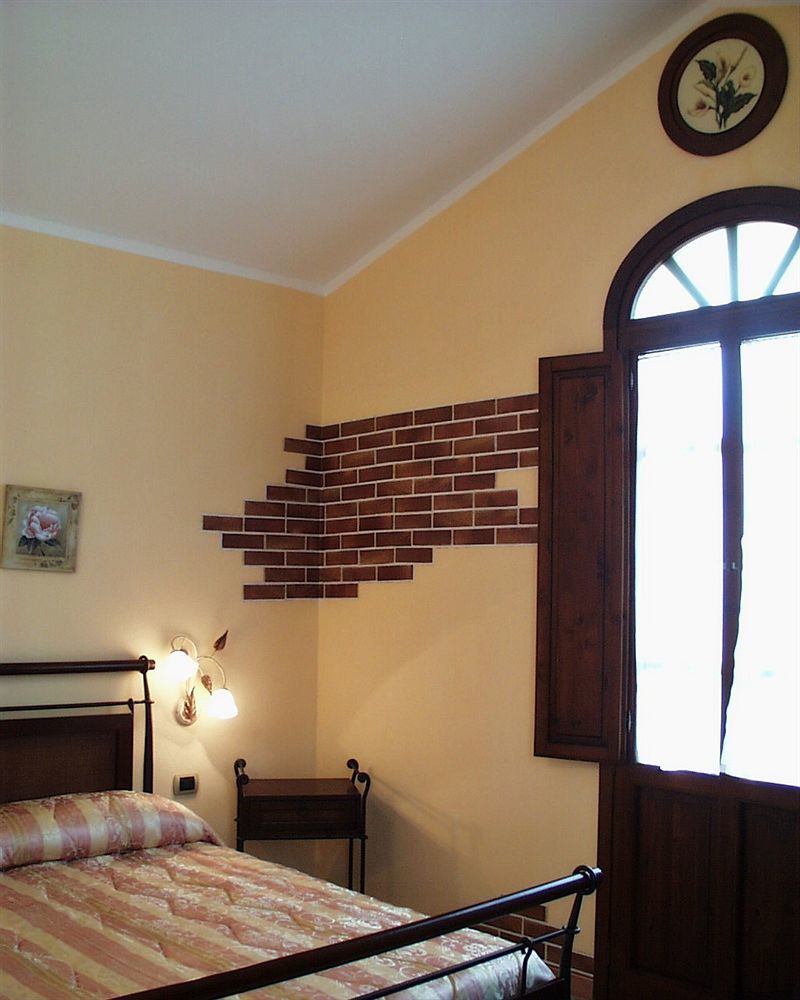 Hotel La Corte Rosada Вилласимиус Экстерьер фото